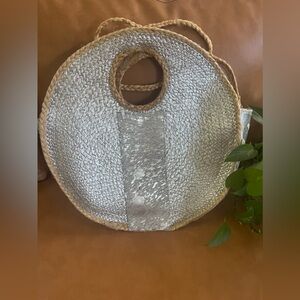 Unique round bag with silver cow hide